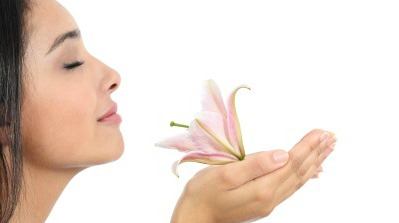 Candle Scent Strength Girl smelling flower